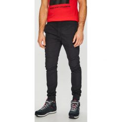 PRODUKT by Jack & Jones - Spodnie 12130098. Niebieskie spodnie materiałowe męskie PRODUKT by Jack & Jones, bez wzorów, z tkaniny, casualowe. W wyprzedaży za 79.90 zł.