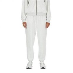 Spodnie sportowe damskie New Balance WP41500AHH. Białe spodnie sportowe damskie New Balance, m, z dresówki, na fitness i siłownię. Za 313.00 zł.