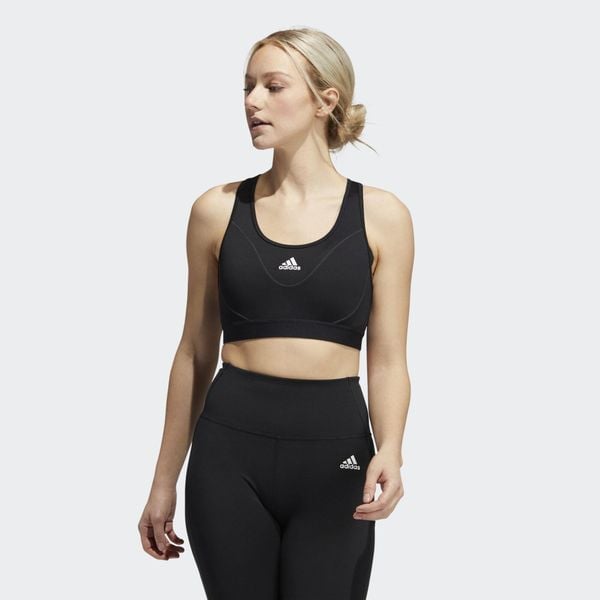 Top sportowy damski Adidas Reflective. Białe topy sportowe damskie Adidas, l, bez wzorów, z elastanu, bez ramiączek. Za 129.49 zł.