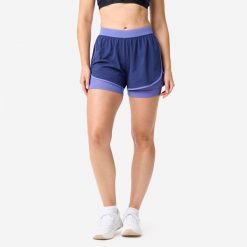 Spodenki fitness cardio damskie Domyos 2 w 1. Fioletowe spodenki sportowe damskie DOMYOS, l, z materiału, na fitness i siłownię. Za 69.99 zł.