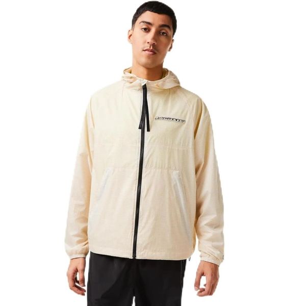 Kurtka sportowa męska Lacoste. Brązowe kurtki treningowe męskie Lacoste, l, z aplikacjami, z materiału, trekkingowe. Za 677.00 zł.
