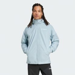 Kurtka Terrex Multi 2L RAIN.RDY. Niebieskie kurtki męskie Adidas, l, bez wzorów, z materiału, sportowe, bez kaptura. W wyprzedaży za 356.70 zł.