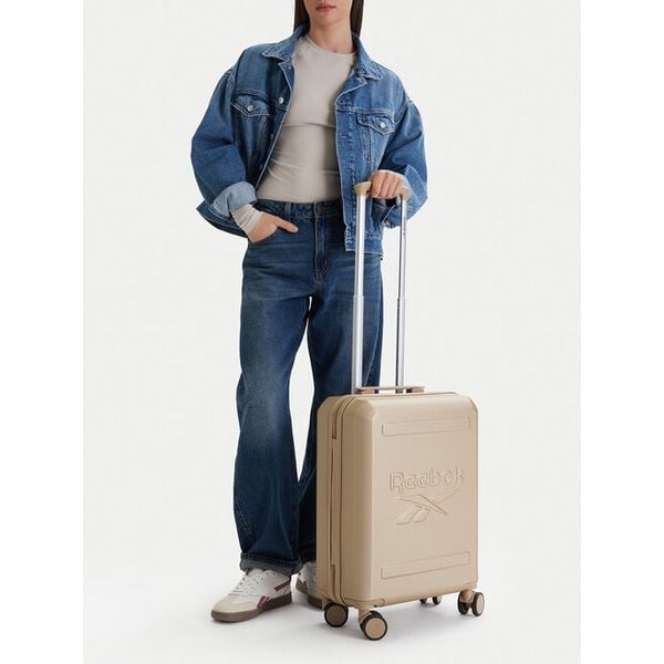 Walizka kabinowa Reebok. Żółte walizki Reebok, bez wzorów. Za 259.99 zł.