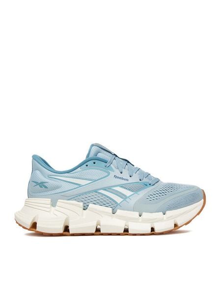 Reebok Buty do biegania EO-FLOATZIG 2 100244482 Niebieski. Niebieskie obuwie do biegania damskie Reebok. Za 489.99 zł.