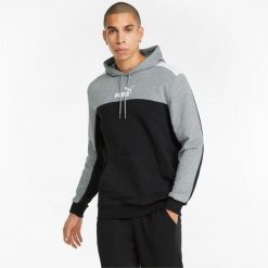 Bluza treningowa męska Puma ESS+ Block Hoodie TR. Czarne bluzy sportowe męskie Puma, bez wzorów, sportowe, bez kołnierzyka, bez ramiączek. Za 169.99 zł.