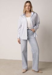 Niebieskie Bawełniane Jeansy o Szerokim Kroju z Wysokim Stanem Jendrea. Niebieskie jeansy damskie Born2be, z podwyższonym stanem. Za 129.99 zł.