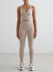Damskie legginsy invisible scrunch, squat proof Shape Seamless beżowy melanż. Brązowe legginsy damskie Aim'n, m, bez wzorów, z dzianiny. Za 177.60 zł.