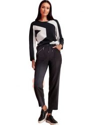 Heine Spodnie dresowe w kolorze czarnym rozmiar: 40. Czarne spodnie dresowe damskie Heine, bez wzorów, z dresówki. Za 110.04 zł.