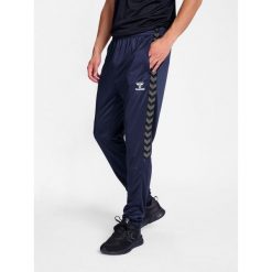 Spodnie dresowe treningowe Hummel Authentic. Niebieskie spodnie sportowe damskie HUMMEL, z dresówki, do biegania. Za 193.50 zł.