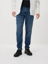 Jeansy carrot z efektem sprania - indigo jeans. Niebieskie jeansy męskie Reserved. Za 139.99 zł.
