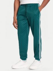 Guess Spodnie dresowe Z5BB19 K2042 Zielony Regular Fit. Zielone spodnie dresowe męskie Guess, z aplikacjami, z dresówki. Za 529.99 zł.