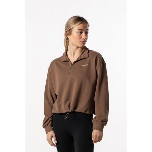 Damska krótka bluza z krótkim zamkiem i opuszczonym ramieniem – brązowy. Brązowe bluzy sportowe damskie AESTHETIC WOLF, l, bez wzorów, z bawełny, bez ramiączek, krótkie, bez kaptura. Za 259.99 zł.