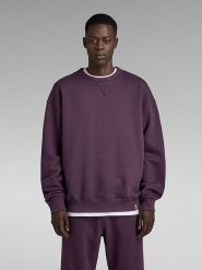 G-Star Sweter w kolorze fioletowym rozmiar: S. Różowe swetry męskie G-Star, s, bez wzorów, z bawełny, bez kołnierzyka. Za 166.88 zł.