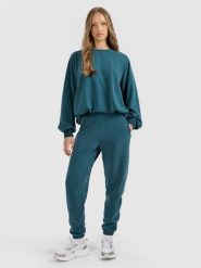 4F Spodnie dresowe joggery z modalem damskie - turkusowe M. Niebieskie spodnie dresowe damskie 4f, m, bez wzorów, z dresówki. Za 169.99 zł.