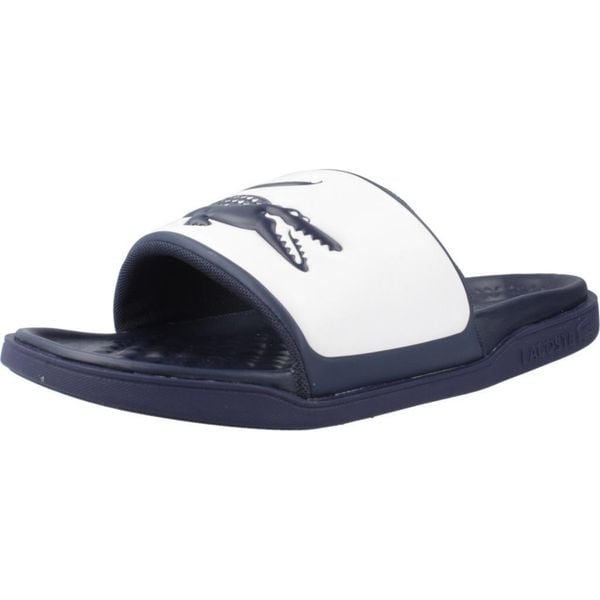 Klapki Lacoste Model Serve Slide Dual Kolor Niebieski. Niebieskie klapki i japonki męskie Lacoste, z syntetyku. Za 309.70 zł.