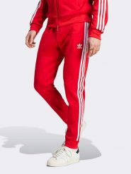 Adidas Spodnie dresowe w kolorze czerwonym rozmiar: XL. Czerwone spodnie dresowe męskie Adidas, bez wzorów, z dresówki. Za 193.95 zł.