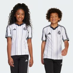 Koszulka Real Madrid US Pack. Białe bluzki sportowe damskie Adidas, m, z poliesteru, bez ramiączek, do piłki nożnej. Za 367.27 zł.