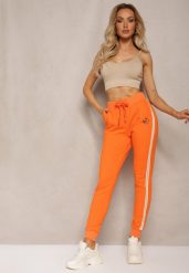 Pomarańczowe Spodnie Dresowe High Waist z Lampasami Skadia. Brązowe spodnie dresowe damskie Renee, l, bez wzorów, z dresówki. Za 34.99 zł.