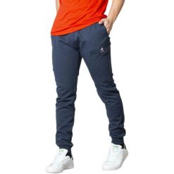 Spodnie Le Coq Sportif Ess Regular M Niebieskie Dorosłych. Niebieskie spodnie sportowe męskie Le Coq Sportif, z bawełny. Za 258.60 zł.