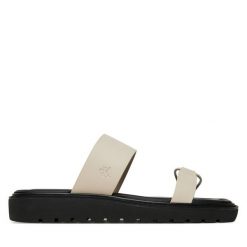 Klapki Calvin Klein Jeans. Klapki damskie Calvin Klein Jeans, bez wzorów, z jeansu, bez obcasa. Za 439.99 zł.