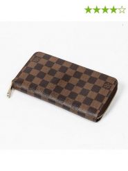 Louis Vuitton Portfel w kolorze brązowym - 19,5 x 10 x 2,5 cm rozmiar: onesize. Brązowe portfele damskie Louis Vuitton, bez wzorów, z materiału. Za 2,253.99 zł.