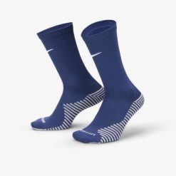 Skarpety Piłkarskie Unisex Dla Dorosłych Strike DriFIT. Niebieskie skarpetki męskie Nike, bez wzorów, z bawełny. Za 49.99 zł.