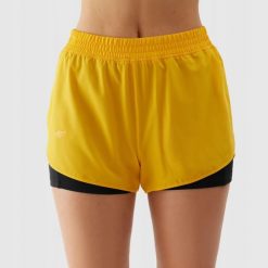 SPODENKI DAMSKIE 4F SZORTY TRENINGOWE SZYBKOSCHNĄCE KRÓTKIE KOLOR POMARAŃCZOWY. Brązowe spodenki sportowe damskie 4f, l, z materiału, do biegania. Za 60.97 zł.