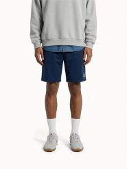 Szorty Le Coq Sportif Essentiels. Niebieskie szorty męskie Le Coq Sportif, z materiału, bez kołnierzyka. Za 256.00 zł.