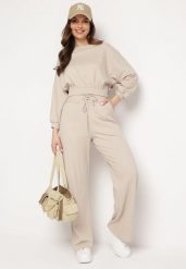 Beżowy Komplet Bawełniany Spodnie Szerokie ze Sznurkiem w Pasie i Bluza ze Ściągaczami Urionne. Brązowe bluzy bez kaptura damskie Born2be, bez wzorów, z bawełny, eleganckie. Za 169.99 zł.