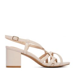 Sandały JENNY. Brązowe sandały damskie Jenny, bez wzorów, bez obcasa, na słupku. Za 119.99 zł.