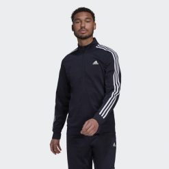 Kurtka z dresu adidas 3-Stripes Essentials Warm-Up. Białe kurtki męskie Adidas, l, bez wzorów, z dresówki, bez kaptura. Za 213.00 zł.