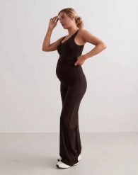 Damskie spodnie ciążowe, luźne, szerokie nogawki, wysoki stan Sense czekolada. Brązowe spodnie sportowe damskie Aim'n, xl, z dzianiny, na fitness i siłownię. Za 344.00 zł.