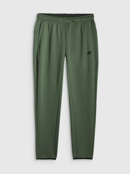 Spodnie treningowe z wykończeniem szybkoschnącym męskie zielone 4F L Zielony. Zielone spodnie materiałowe męskie Under Armour, bez wzorów, z elastanu. Za 199.99 zł.