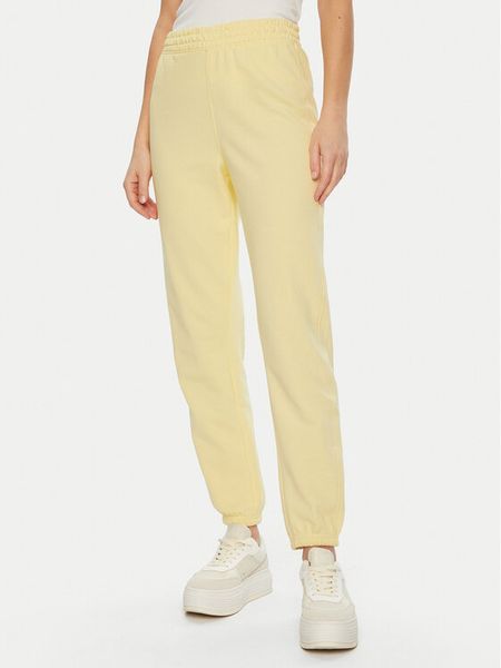ONLY Spodnie dresowe Bella 15312094 Żółty Regular Fit. Żółte spodnie dresowe damskie Only, l, bez wzorów, z bawełny. Za 69.99 zł.
