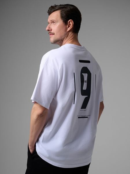4F T-shirt loose z nadrukiem męski 4F x Robert Lewandowski - biały S. Białe t-shirty męskie 4f, l, bez wzorów, z bawełny, bez kołnierzyka. Za 99.99 zł.
