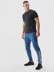 4F Spodnie treningowe szybkoschnące męskie - niebieskie 3XL. Niebieskie spodnie sportowe męskie 4f, z dzianiny. W wyprzedaży za 79.99 zł.