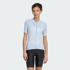 KOSZULKA DO JAZDY NA ROWERZE ESSENTIALS MORPH GRAPHIC. Zielone bluzki sportowe damskie Adidas, m, bez wzorów, z dzianiny, bez ramiączek. Za 349.00 zł.