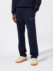 Champion Spodnie dresowe w kolorze granatowym rozmiar: M. Niebieskie spodnie dresowe męskie CHAMPION, bez wzorów, z bawełny. Za 126.45 zł.