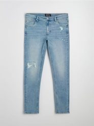 Jeansy slim fit z przetarciami i efektem sprania - niebieski. Niebieskie jeansy męskie Sinsay. Za 79.99 zł.