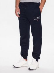 Tommy Hilfiger Spodnie dresowe UM0UM02880 Granatowy Regular Fit. Niebieskie spodnie dresowe męskie Tommy Hilfiger, bez wzorów, z bawełny. Za 299.99 zł.