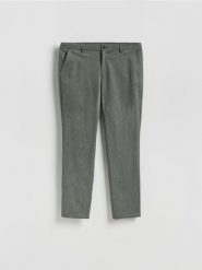 Spodnie chino slim fit - jasnozielony. Zielone spodnie materiałowe męskie Reserved, bez wzorów, z bawełny. Za 159.99 zł.