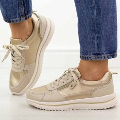 Beżowe skórzane półbuty damskie Jezzi 9784. Brązowe półbuty damskie Jezzi, bez wzorów, ze skóry, casualowe, z okrągłym noskiem, bez obcasa, na płaskiej podeszwie. Za 229.00 zł.