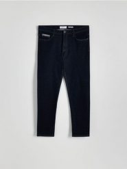 Jeansy slim fit - granatowy. Niebieskie jeansy męskie Reserved. W wyprzedaży za 89.99 zł.