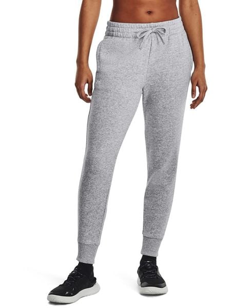 Under Armour Spodnie dresowe "Rival" w kolorze szarym rozmiar: XS. Szare spodnie dresowe damskie Under Armour, xs, bez wzorów, z dresówki. Za 135.17 zł.