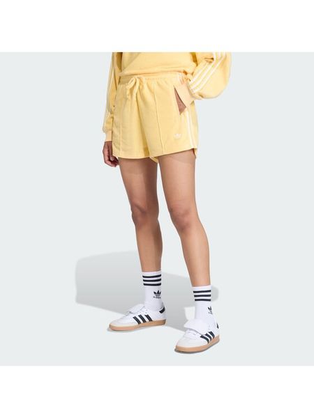 Adidas Szorty sportowe Terry Towel Firebird KD1395 Żółty Loose Fit. Żółte spodenki sportowe damskie Adidas, xs, z bawełny. Za 152.99 zł.