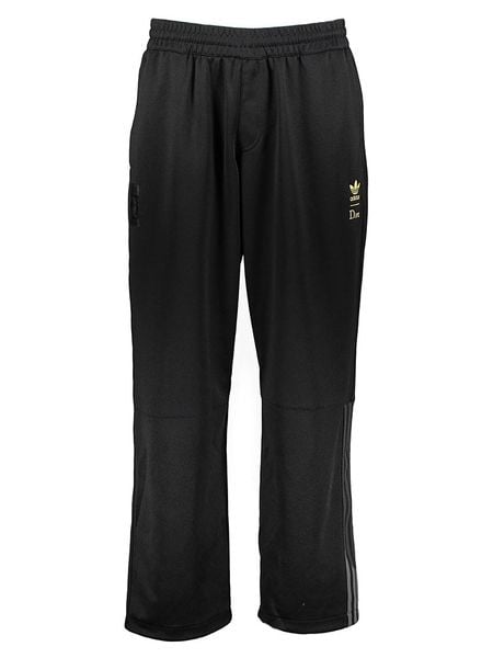 Adidas Spodnie sportowe w kolorze czarnym rozmiar: XS. Czarne spodnie sportowe męskie Adidas, z materiału. Za 65.54 zł.