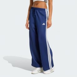 Spodnie dresowe Stadium 3-Stripes. Niebieskie spodnie sportowe damskie Adidas, s, z bawełny. Za 279.00 zł.