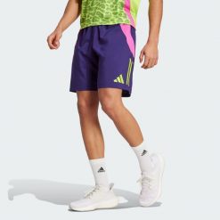 Szorty Generation Predator Downtime. Fioletowe szorty męskie Adidas, bez wzorów, z materiału, sportowe. W wyprzedaży za 135.40 zł.
