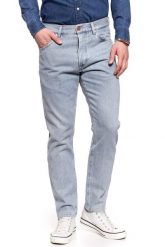 WRANGLER SPODNIE MĘSKIE SLIDER ICE BLUE W18RWG72B 112127409. Niebieskie spodnie materiałowe męskie Wrangler, bez wzorów, z jeansu. Za 209.99 zł.