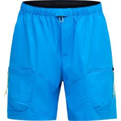 Spodenki turystyczne Peak Performance Outdoor Cargo Shorts. Niebieskie szorty męskie Peak Performance, bez wzorów, eleganckie. Za 372.89 zł.